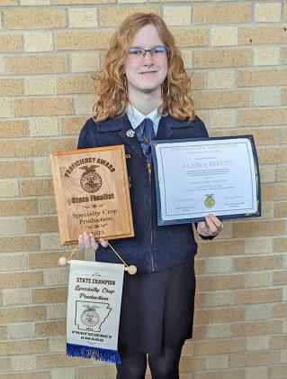 ALAINA REEVES - Alaina Reeves, a senior at Rison High School, poses with some of the awards she won during the Arkansas FFA Convention held this past spring.