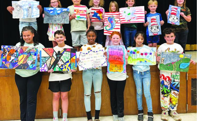 RISON ELEMENTARY ARTISTS OF THE MONTH: MARCH - Bottom row, left to right: Lia Arp, Bryant Branch, Brentleigh Dodds, Olivia Lawson, Emily Morales, Jaxson Pennington; Top row, left to right: Ayden Spenc er, Laycee McMahon, Draven Dominguez, Ireland Horne, Annabelle Besaw, Piper Phillips, Jett Gray, Tessa Stephenson.